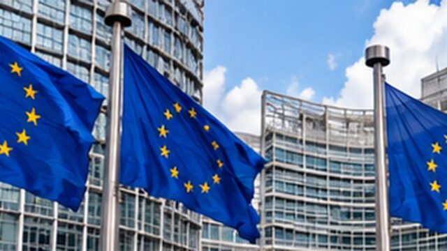 Flagi Unii Europejskiej przy instytucjach w Brukseli — ilustracja szczytu